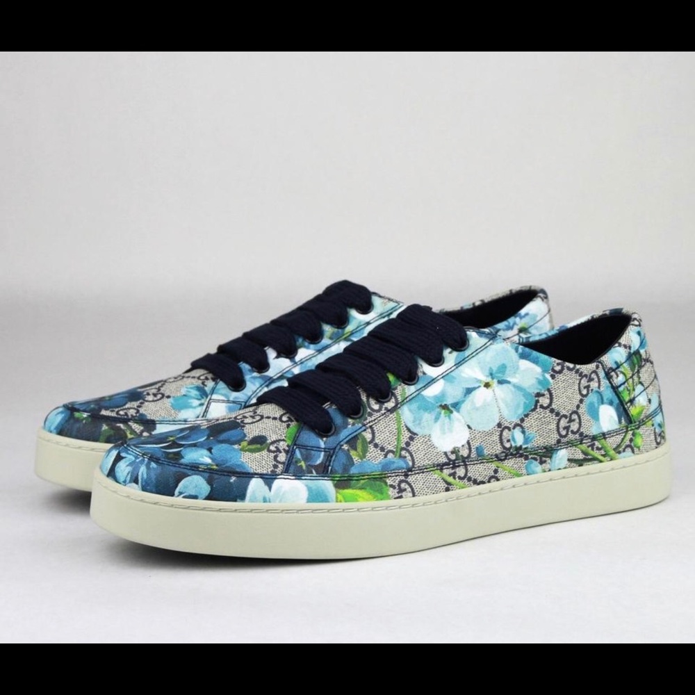 Gucci floral printed GG Supreme sneakers.